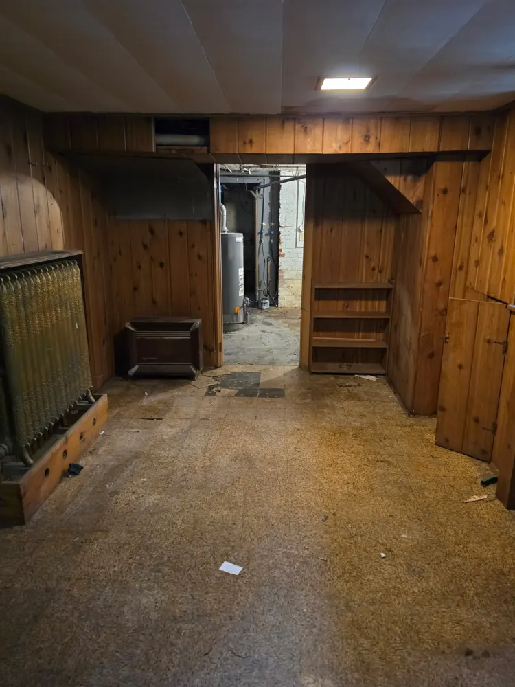 After: wood-paneled basement emptied — Pioneer Valley Junk Removal job