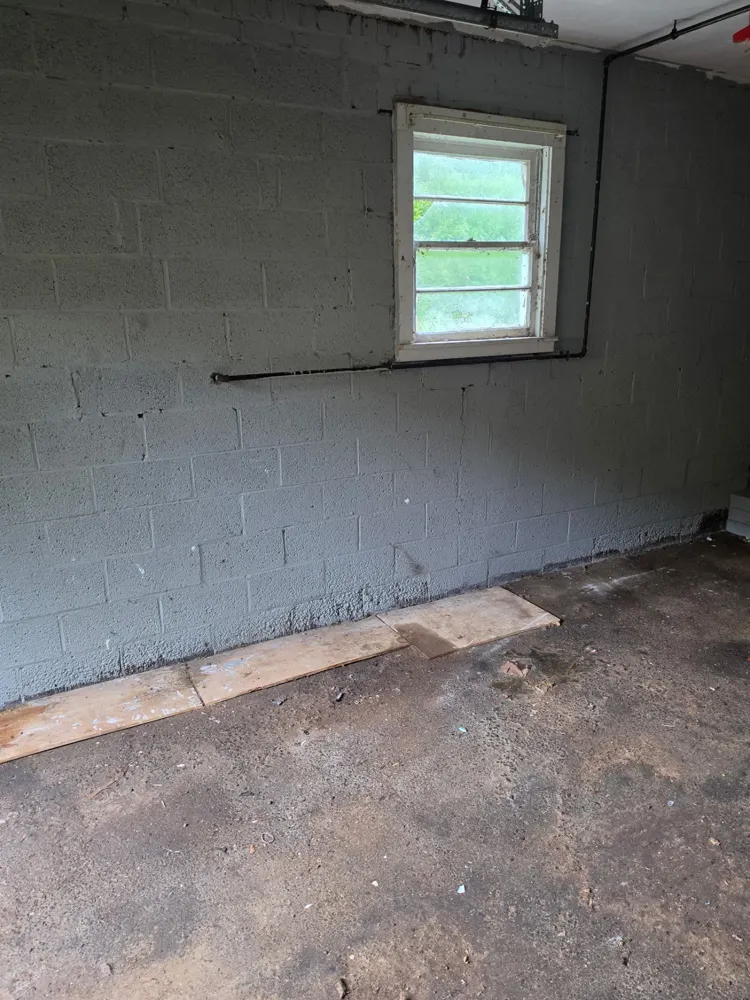 After: storage room full of boxes, emptied — Pioneer Valley Junk Removal job