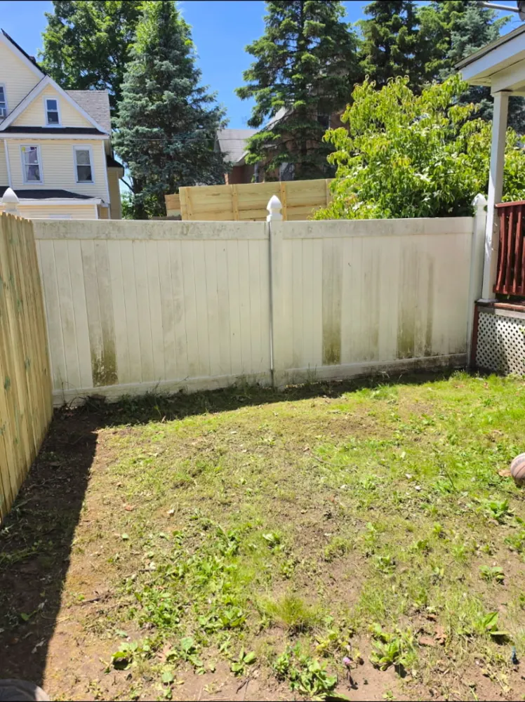 After: backyard debris pile cleared — Pioneer Valley Junk Removal job